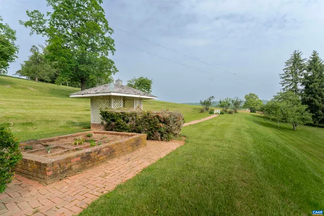 a view of a house with a big yard