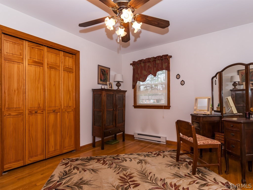 2209 Staten Road Chester, VA 23831 - Photo 11 of 24 a bedroom with a bed and a dresser