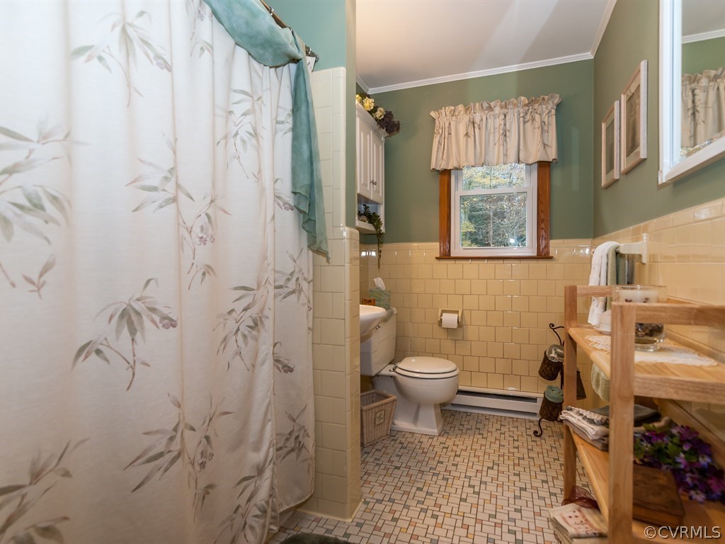 2209 Staten Road Chester, VA 23831 - Photo 15 of 24 a bathroom with a toilet sink and shower