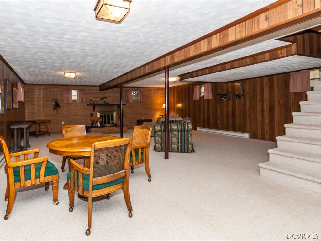 2209 Staten Road Chester, VA 23831 - Photo 18 of 24 a dining space with furniture and a table