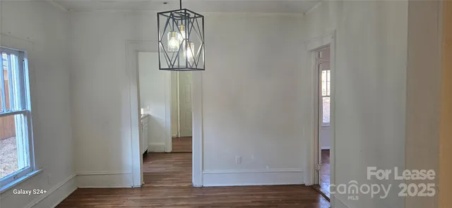 a view of entryway with wooden floor
