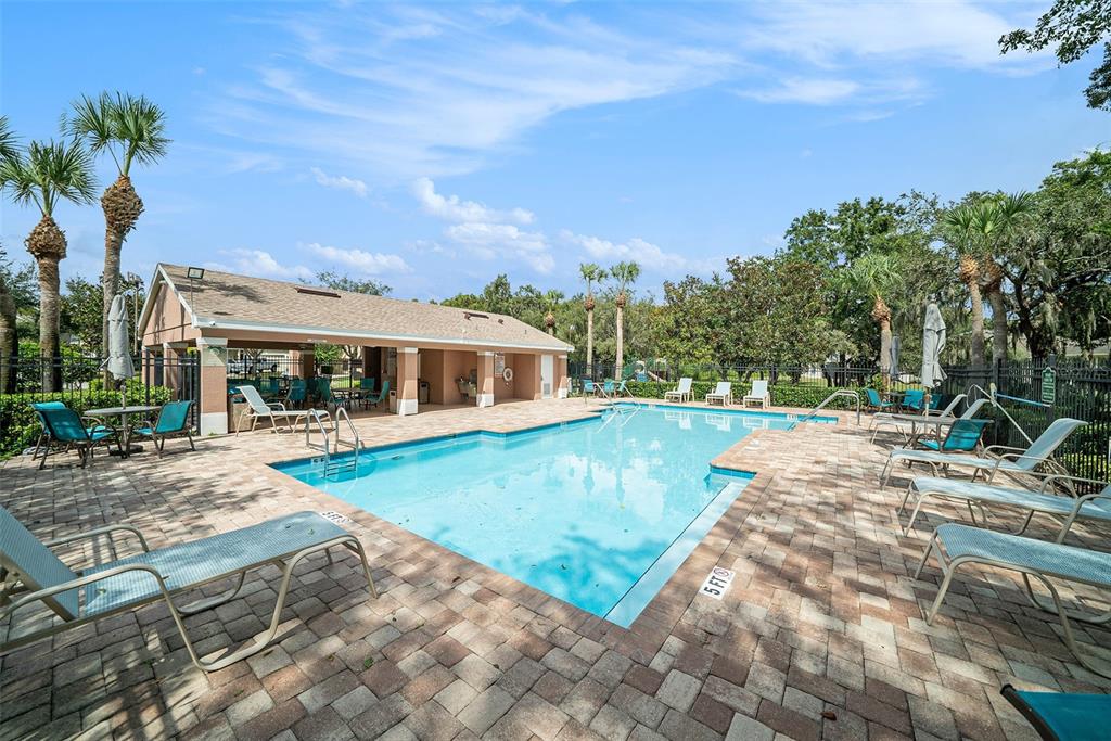 12045 Colony Lakes Boulevard New Port Richey, FL 34654 - Photo 20 of 22 a view of a house with backyard and sitting area