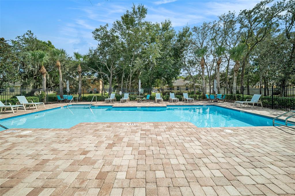 12045 Colony Lakes Boulevard New Port Richey, FL 34654 - Photo 21 of 22 a view of swimming pool with a yard