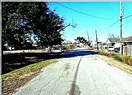 a view of swimming pool with outdoor seating