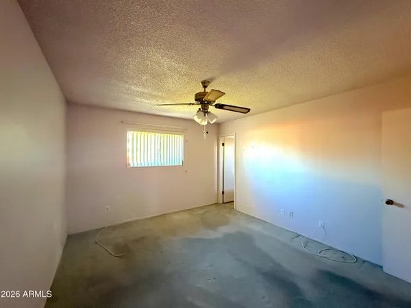 a view of a window in an empty room