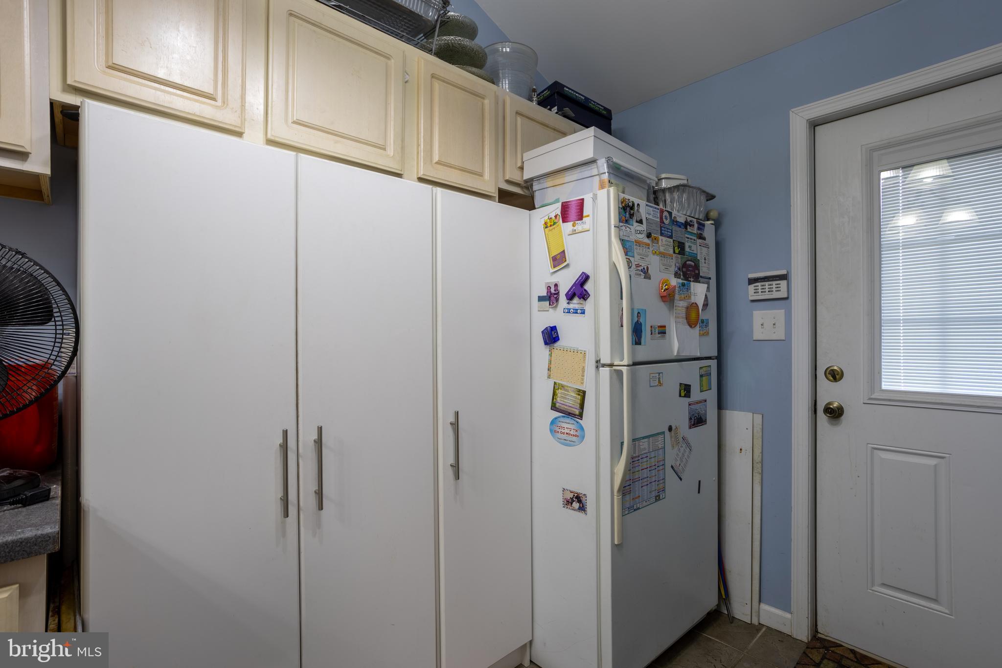 3215 Northbrook Road Baltimore, MD 21208 - Photo 16 of 50 a utility room with dryer and washer