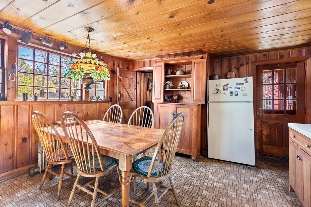 357 Commonwealth Road Wayland, MA 01778 - Photo 14 of 33 a view of a dining room with furniture window and refrigerator