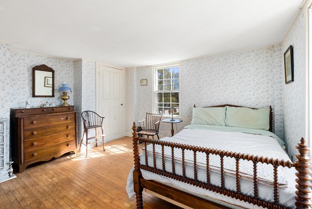 357 Commonwealth Road Wayland, MA 01778 - Photo 21 of 33 a bedroom with a bed and a dresser