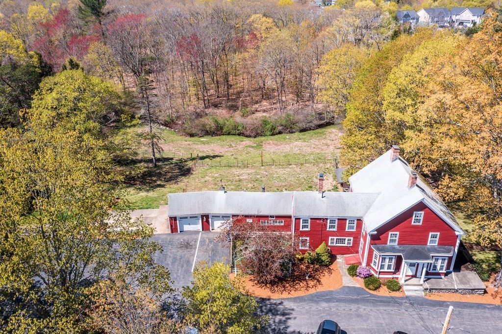 357 Commonwealth Road Wayland, MA 01778 - Photo 6 of 33 an aerial view of a house with a yard and garden