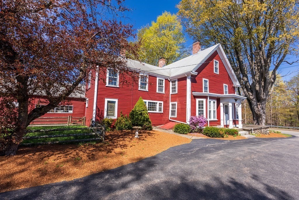 357 Commonwealth Road Wayland, MA 01778 - Photo 8 of 33 a front view of a house with yard and green space