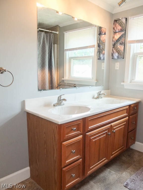 406 Raff Road Northwest Canton, OH 44708 - Photo 12 of 17 Remodeled full bath with dual sinks.