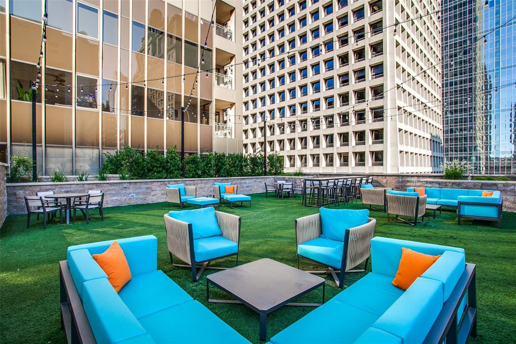 1200 Main Street, Unit 812 Dallas, TX 75202 - Photo 14 of 17 a view of a chair and table in the backyard