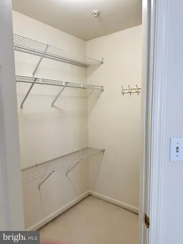 a view of a room with racks on the wall