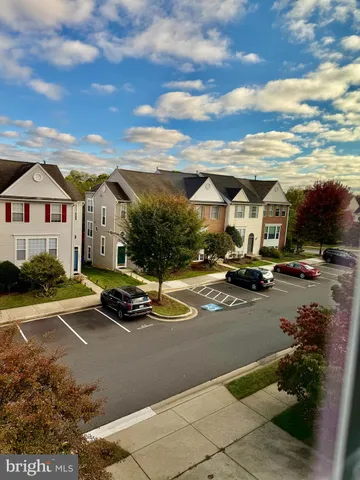 a view of a city street with cars