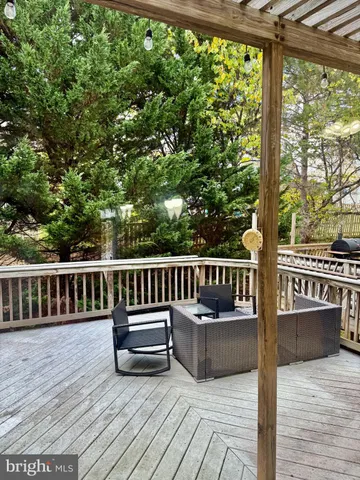 a view of balcony with wooden floor