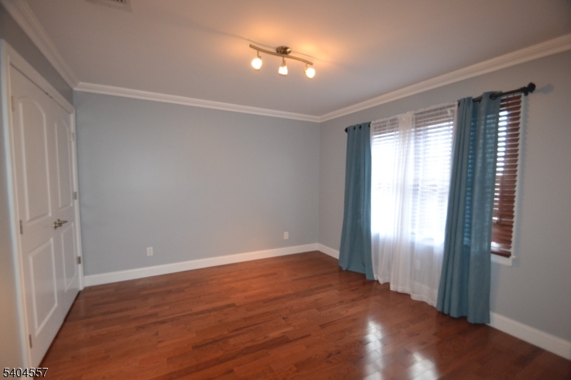 204 Market Street Garfield, NJ 07026 - Photo 29 of 36 a view of an empty room with a window