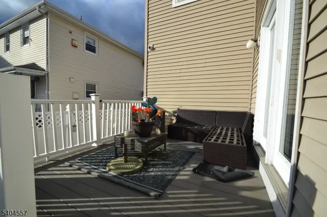 a view of a chairs and table on the deck