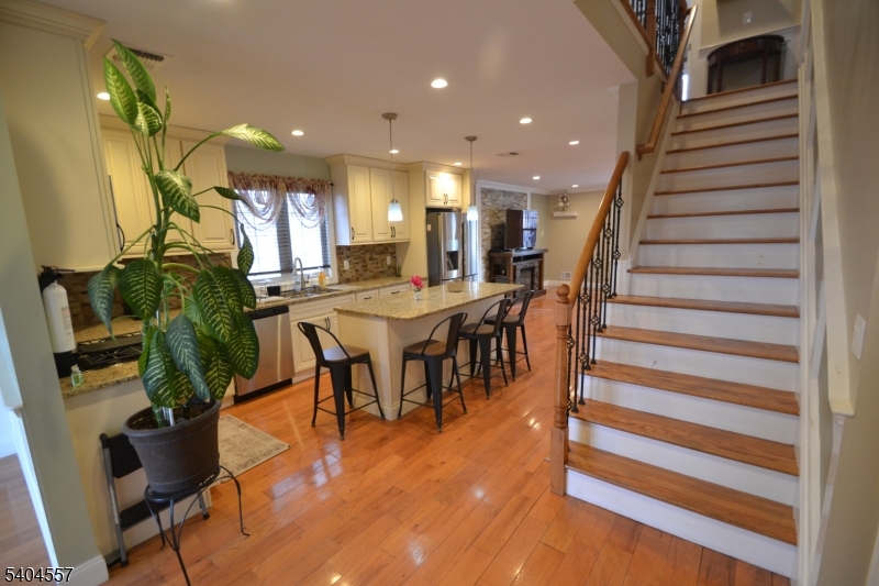 204 Market Street Garfield, NJ 07026 - Photo 7 of 36 a dining room with furniture and wooden floor