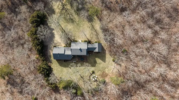 a view of house with trees