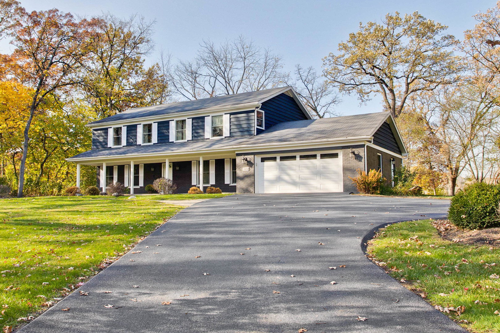 20890 West Exeter Road Kildeer, IL 60047 - Photo 2 of 62 a front view of a house with a yard and trees