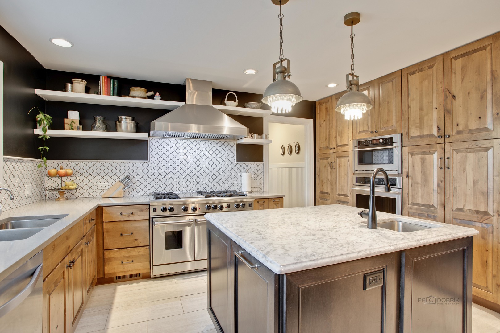 20890 West Exeter Road Kildeer, IL 60047 - Photo 26 of 62 a kitchen with stainless steel appliances granite countertop a stove a sink and a refrigerator