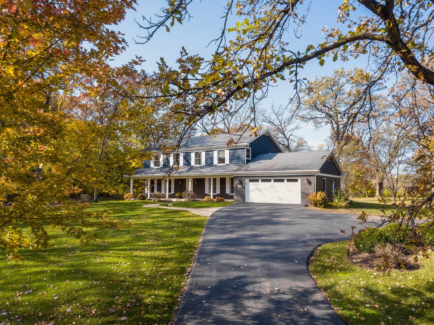 20890 West Exeter Road Kildeer, IL 60047 - Photo 52 of 62 a front view of a house with a garden