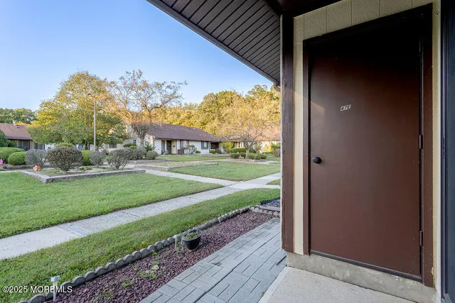 a view of a porch in front of a house