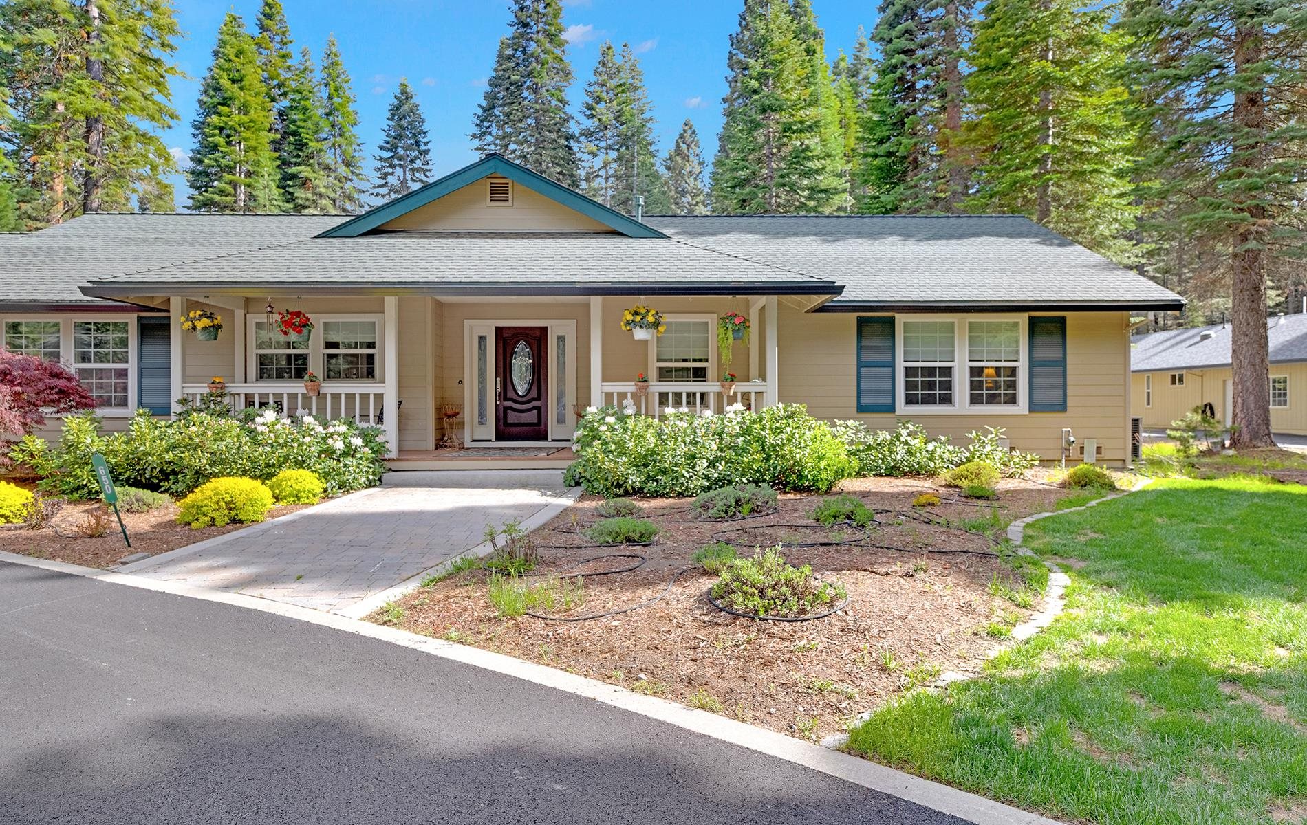 650 Wagon Road Chester, CA 96020 - Photo 29 of 36 a front view of a house with garden