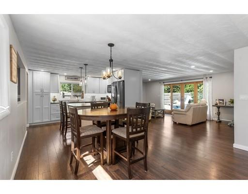 5 Samuel Road Chelmsford, MA 01824 - Photo 3 of 17 a view of a dining room with furniture and wooden floor