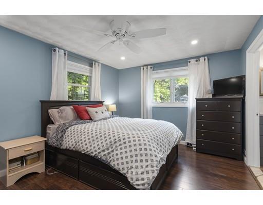 5 Samuel Road Chelmsford, MA 01824 - Photo 8 of 17 a bedroom with a bed and a dresser