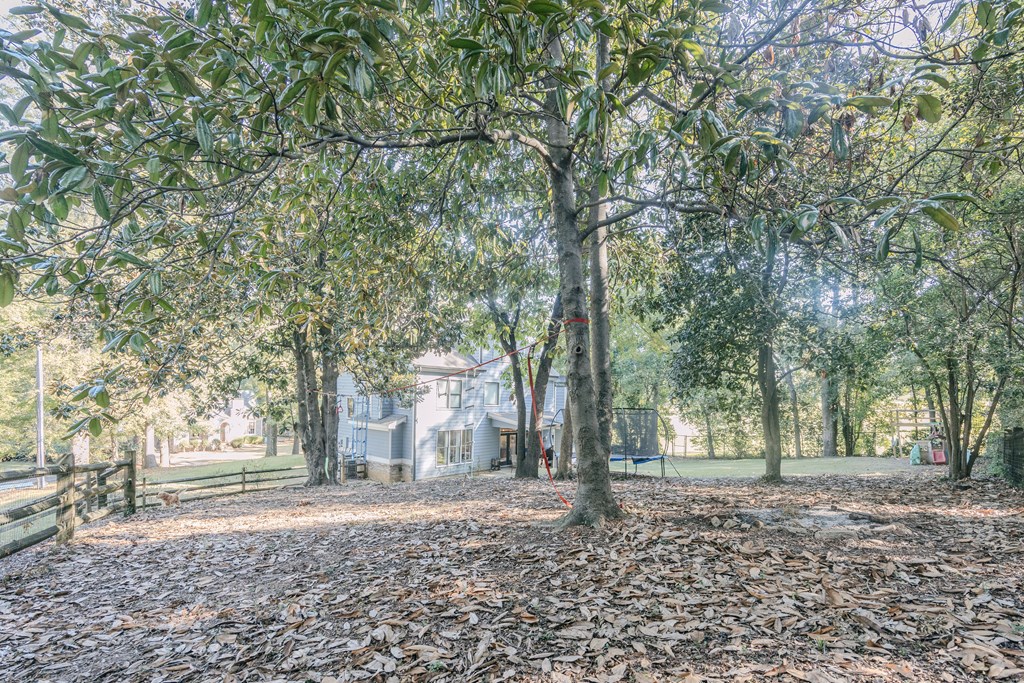 3232 Hillside Way Columbus, GA 31906 - Photo 61 of 61 a backyard of a house with trees