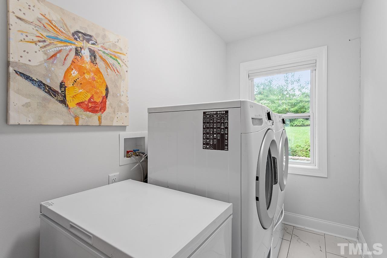 2214 Glascock Street Raleigh, NC 27610 - Photo 30 of 36 a utility room with dryer and washer