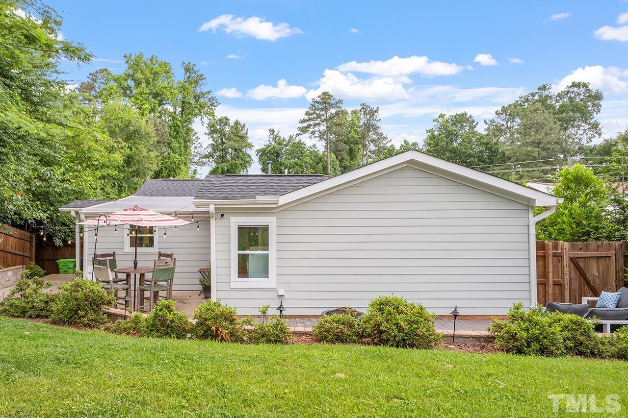 2214 Glascock Street Raleigh, NC 27610 - Photo 35 of 36 a view of a house with a yard
