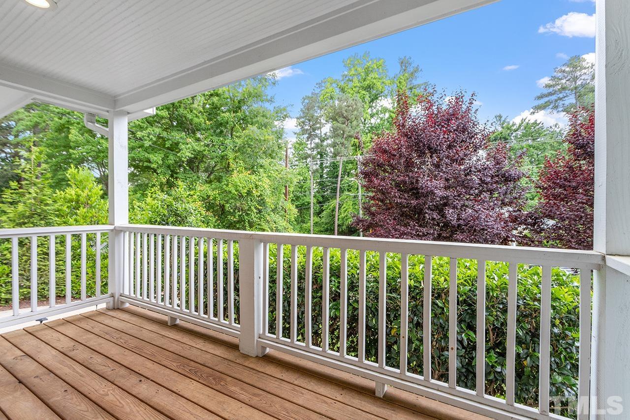 2214 Glascock Street Raleigh, NC 27610 - Photo 5 of 36 a view of a balcony with wooden floor