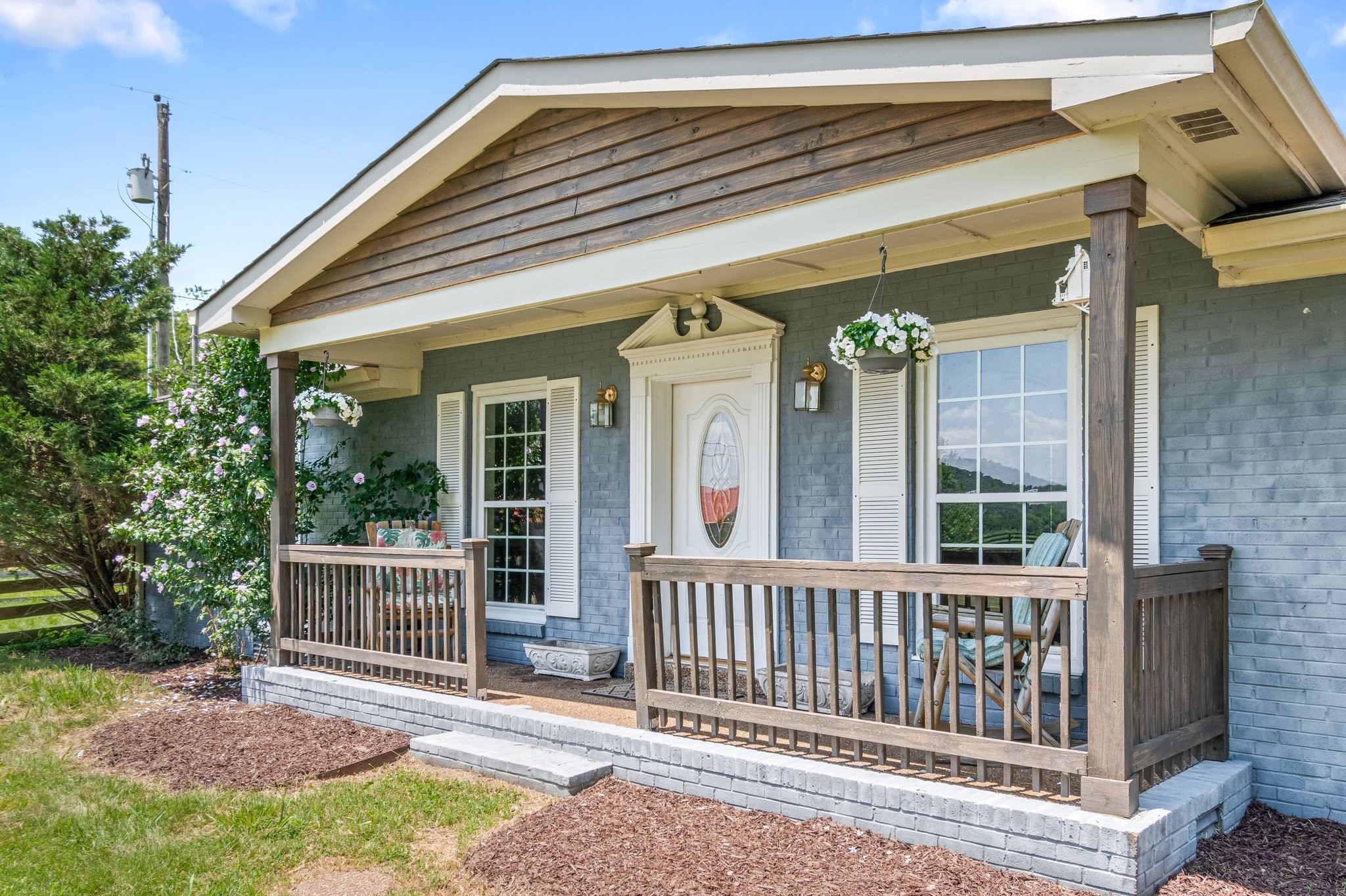 a view of a house with a porch