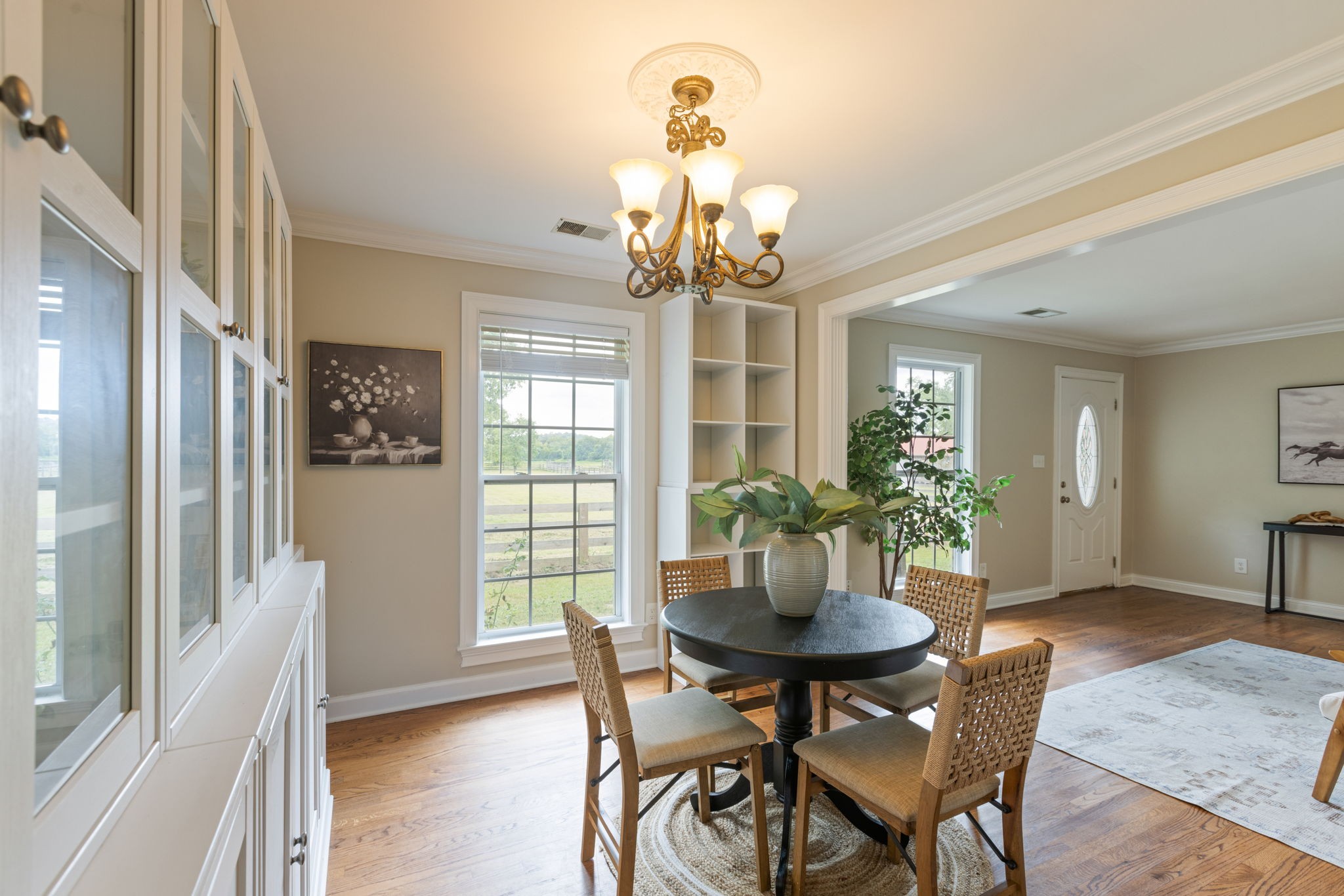 1586 Coleman Road Franklin, TN 37064 - Photo 11 of 73 a view of a dining room with furniture window and wooden floor