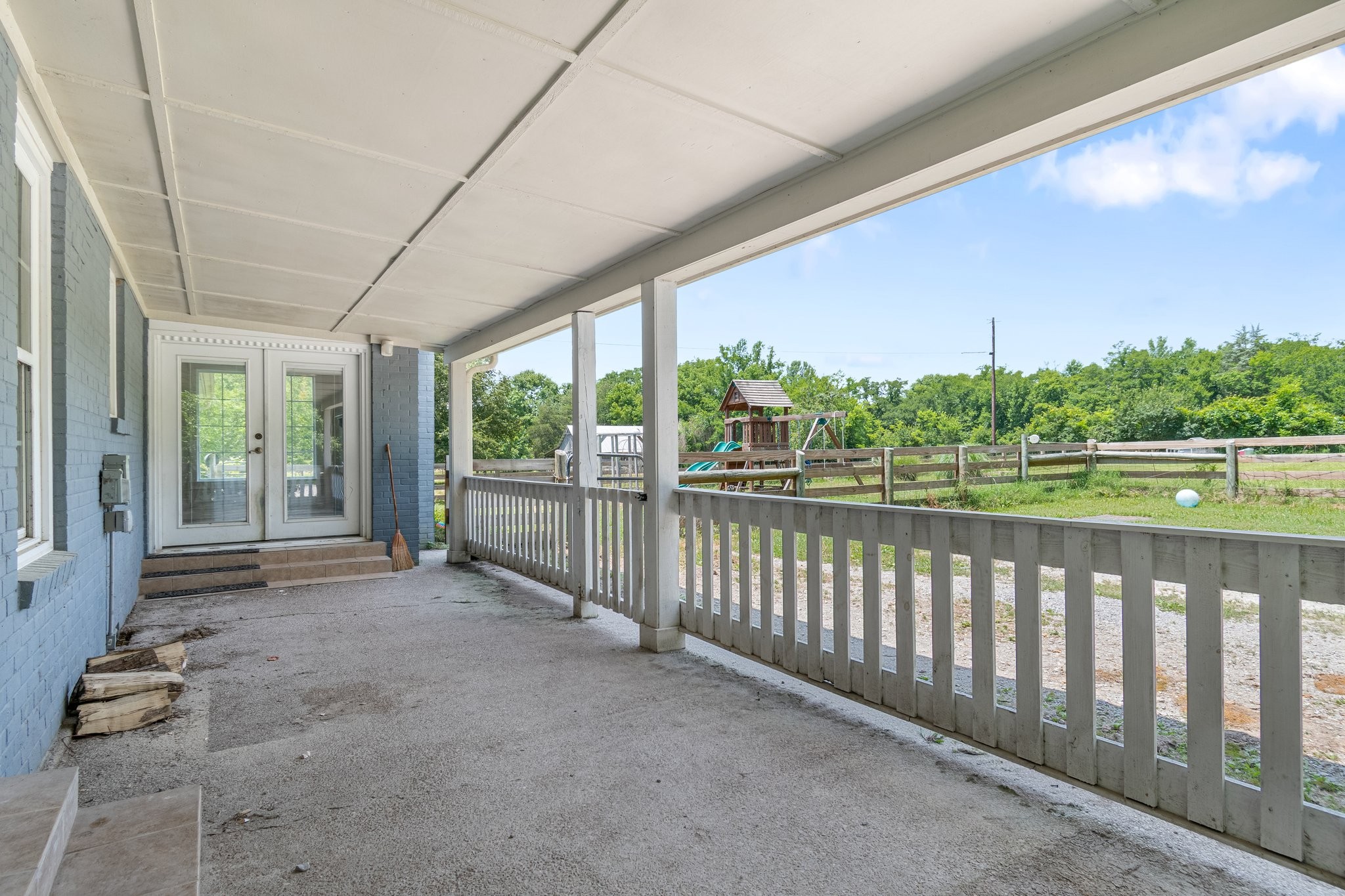 1586 Coleman Road Franklin, TN 37064 - Photo 31 of 73 a view of a porch with wooden floor and outdoor space