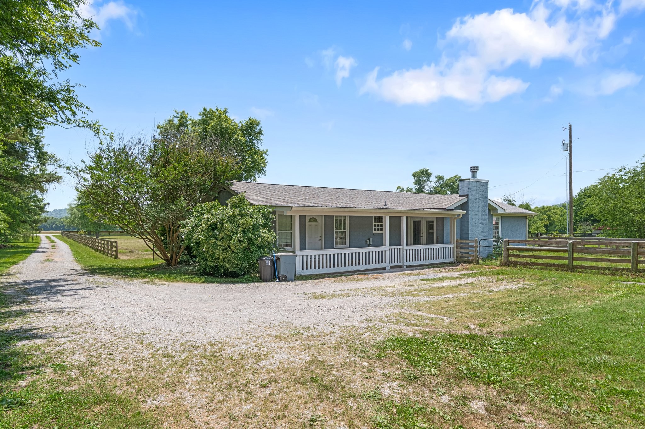 1586 Coleman Road Franklin, TN 37064 - Photo 33 of 73 a front view of a house with a yard