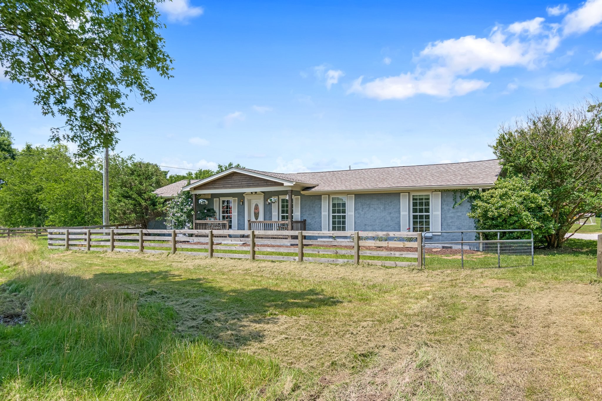 1586 Coleman Road Franklin, TN 37064 - Photo 4 of 73 a swimming pool is sitting in front of a house with a big yard