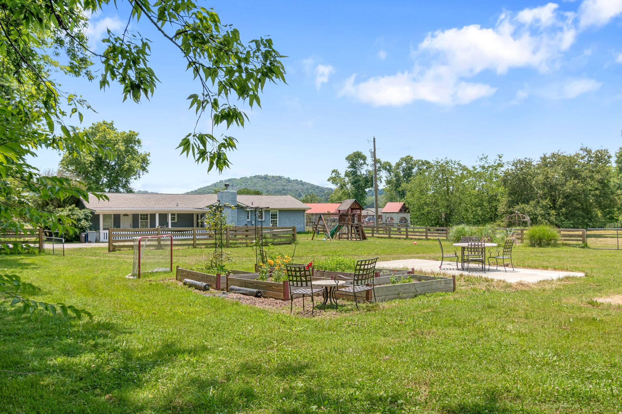 1586 Coleman Road Franklin, TN 37064 - Photo 41 of 73 a view of a house with a yard porch and sitting area