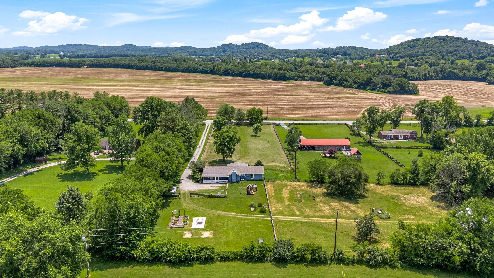 1586 Coleman Road Franklin, TN 37064 - Photo 57 of 73 an aerial view of residential houses with outdoor space and river