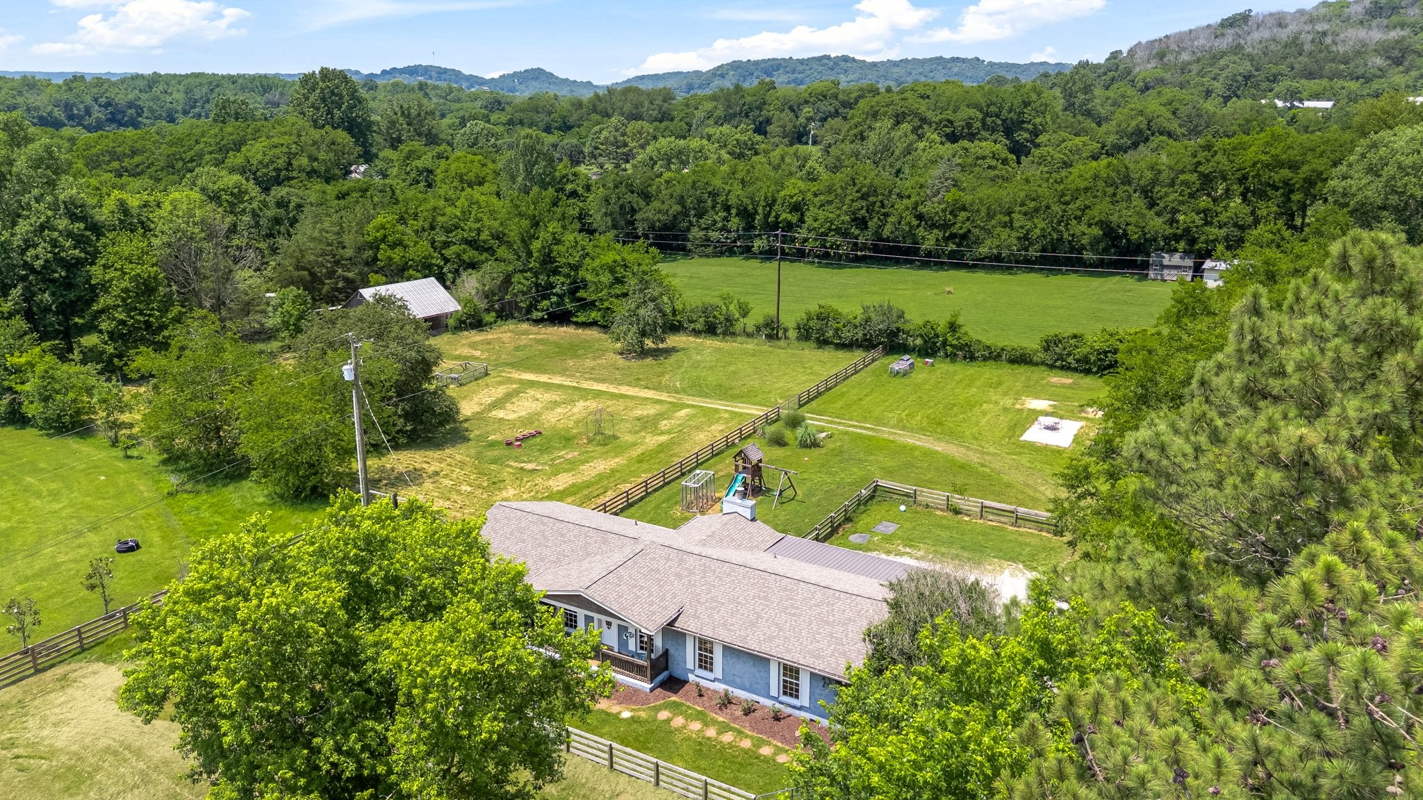 1586 Coleman Road Franklin, TN 37064 - Photo 62 of 73 an aerial view of a house with a yard basket ball court and outdoor seating