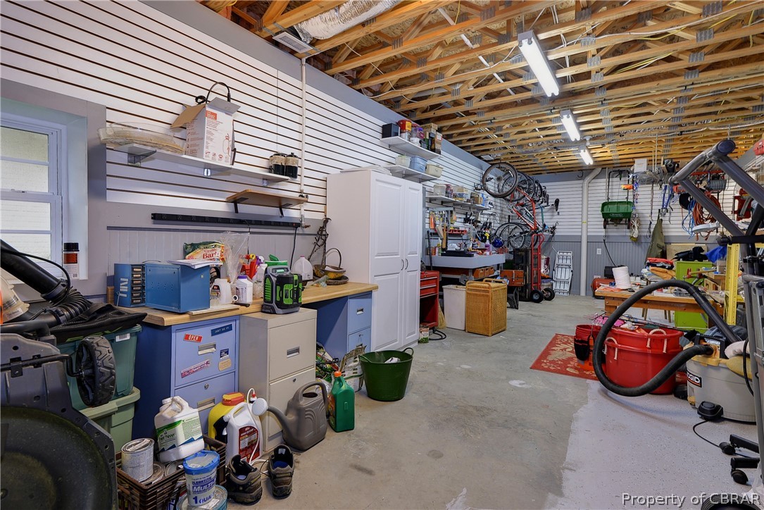 4235 Old Lock Road Williamsburg, VA 23188 - Photo 29 of 46 There is tons of unfinished storage plus a full workshop in the lower level.