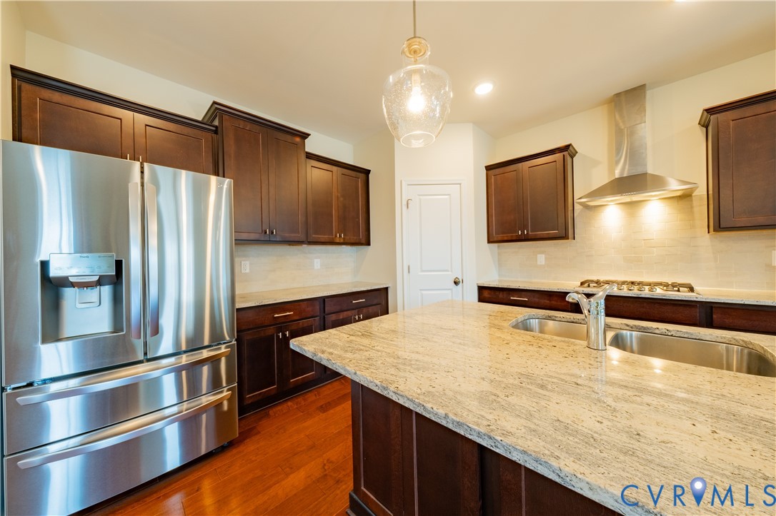 15607 Crowden Road Chesterfield, VA 23832 - Photo 21 of 57 Kitchen featuring wood-finish flooring, dark wood
