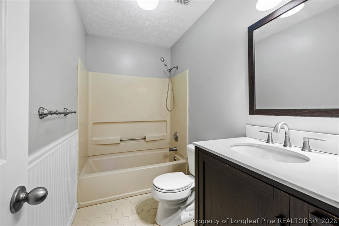 1205 Crossbend Court Fayetteville, NC 28314 - Photo 24 of 37 a bathroom with a sink toilet and shower