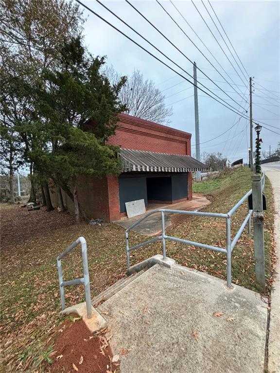 a front view of a house with parking area