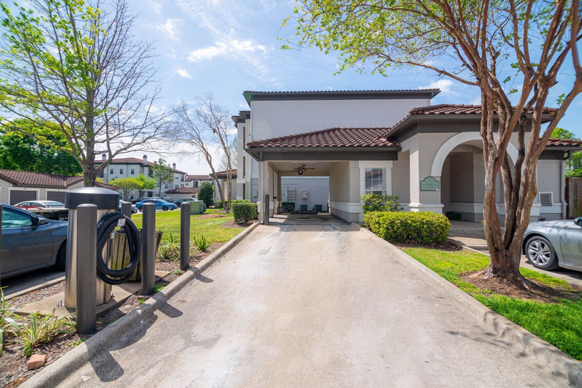 2840 Shadowbriar Drive, Unit B3 Houston, TX 77077 - Photo 15 of 22 a view of a house with a yard