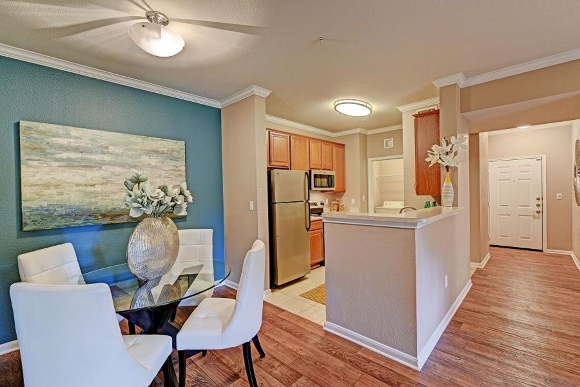 2840 Shadowbriar Drive, Unit B3 Houston, TX 77077 - Photo 6 of 22 a living room with furniture and a wooden floor
