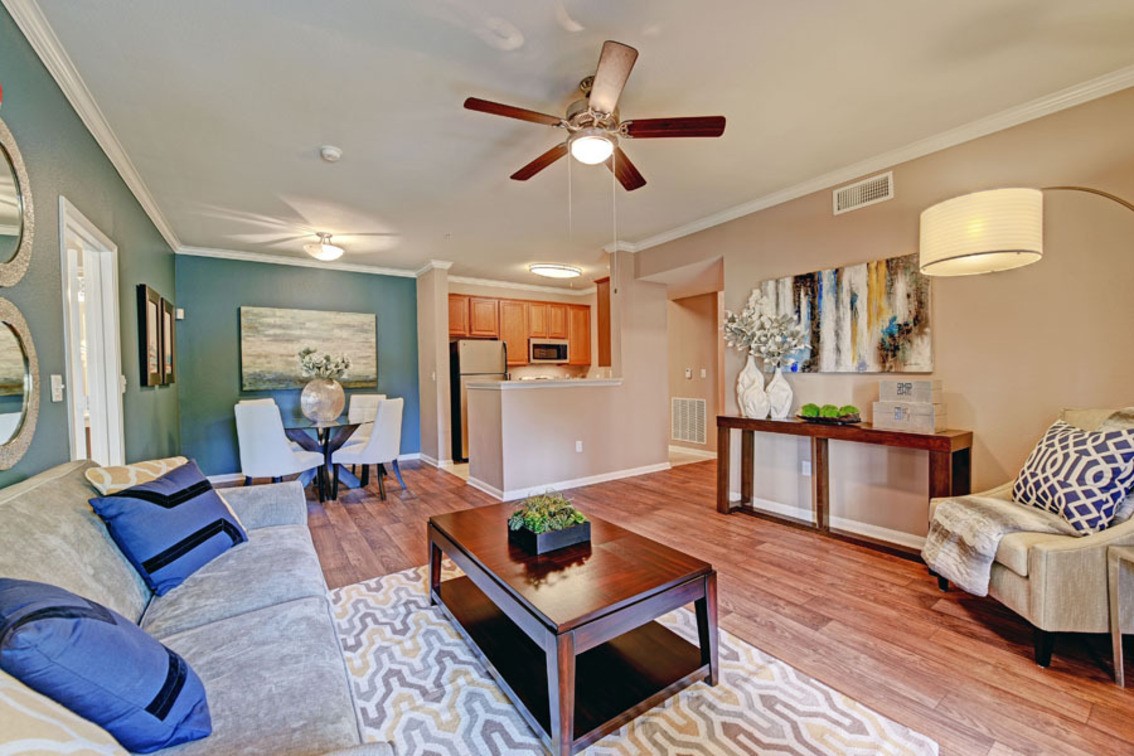 2840 Shadowbriar Drive, Unit B3 Houston, TX 77077 - Photo 9 of 22 a living room with furniture and a wooden floor