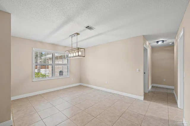 a kitchen with a refrigerator sink and stove